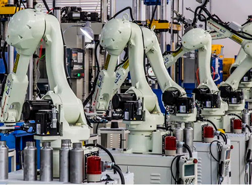 Robotic arms assembling parts, automated factory production line