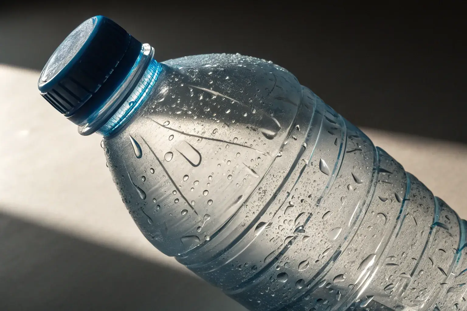 Scratches trap bacteria Scratched bottle surface under light glare